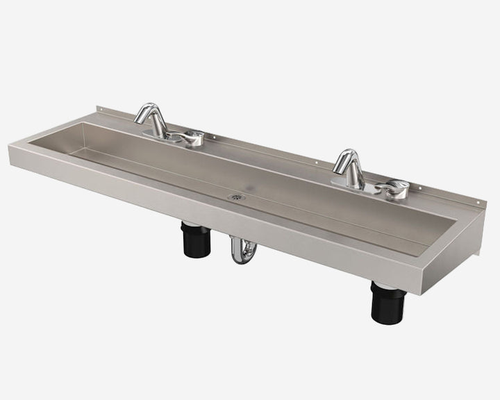 Stainless steel sink with faucets on a white background