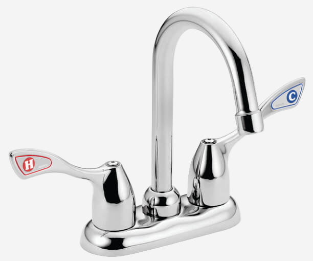 Chrome kitchen faucet with two handles on a white background